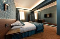 Posteľ alebo postele v izbe v ubytovaní Rosa Salva Hotel