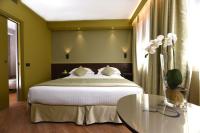 Posteľ alebo postele v izbe v ubytovaní Rosa Salva Hotel