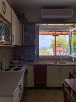 Kuchyňa alebo kuchynka v ubytovaní Casa Lia-Beach Front Villa