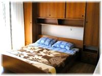 Postel nebo postele na pokoji v ubytování Apartment 696-7 for 4+2 pers. in Lopar