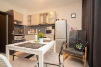 Kuchyň nebo kuchyňský kout v ubytování Vera by RV Apartments