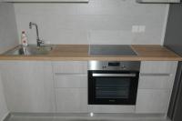 A kitchen or kitchenette at lividio apartment
