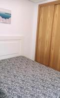 Posteľ alebo postele v izbe v ubytovaní Apartamento Lola