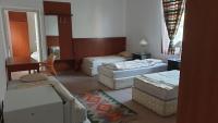 Łóżko lub łóżka w pokoju w obiekcie Aqua Hostel