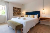 Postel nebo postele na pokoji v ubytování Miramar Luxury 3 bedroom FreshApartments