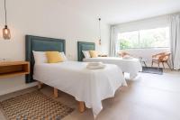 Postel nebo postele na pokoji v ubytování Miramar Luxury 3 bedroom FreshApartments