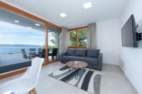 Televízia a/alebo spoločenská miestnosť v ubytovaní Dreamapartment 3524-6