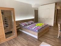 Postel nebo postele na pokoji v ubytování Apartment WELLNESS Vlčková