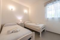 A bed or beds in a room at Villa Zen