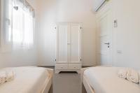 A bed or beds in a room at Villa Zen