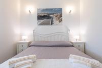 A bed or beds in a room at Villa Zen