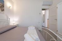 A bed or beds in a room at Villa Zen
