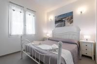 A bed or beds in a room at Villa Zen