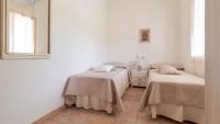 Posteľ alebo postele v izbe v ubytovaní Villa Luisa - Your Holiday in Sardinia