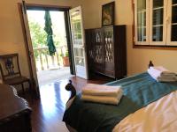 Postel nebo postele na pokoji v ubytování VILLA CATARINA · XuresVillas