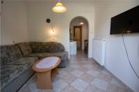 Telewizja i/lub zestaw kina domowego w obiekcie Akácfa 13 Apartman