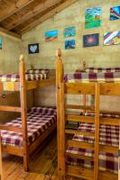 Postel nebo postele na pokoji v ubytování DORMERO Albergue San Miguel Hospital de Órbigo