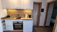 Kuchyň nebo kuchyňský kout v ubytování D&D apartments