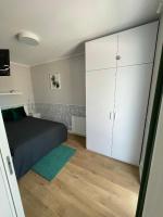 Posteľ alebo postele v izbe v ubytovaní Gąski Apartament Nadmorski