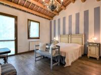 Posteľ alebo postele v izbe v ubytovaní Holiday Home Azienda Agricola Forzello-1 by Interhome