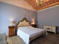 Posteľ alebo postele v izbe v ubytovaní Holiday Home Azienda Agricola Forzello-1 by Interhome