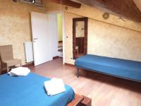 A bed or beds in a room at Porta a Mare, free parking