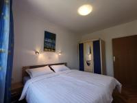 Posteľ alebo postele v izbe v ubytovaní Apartments Jurandvor