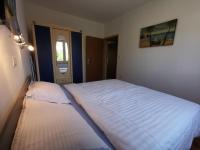 Posteľ alebo postele v izbe v ubytovaní Apartments Jurandvor