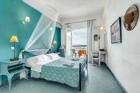 Postel nebo postele na pokoji v ubytování Eros Beach Hotel