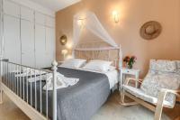 Postel nebo postele na pokoji v ubytování Eros Beach Hotel