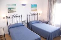 Posteľ alebo postele v izbe v ubytovaní Hostal Alemania
