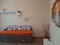 A bed or beds in a room at APPARTAMENTO CASA MARCO