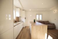 Kuchyň nebo kuchyňský kout v ubytování Apartmani Kiara