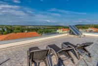 Balkón nebo terasa v ubytování Villa am Meer mit Pool & Kinderpool - Leon's Holiday Homes