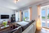 Televízia a/alebo spoločenská miestnosť v ubytovaní Apartment in Liganj 35553