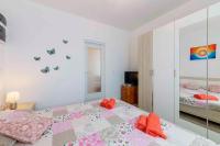 Posteľ alebo postele v izbe v ubytovaní Apartment in Liganj 35553