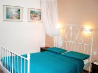 Posteľ alebo postele v izbe v ubytovaní Picturesque Villa in Limnos + Enclosed Garden + Sea View