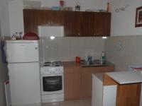 Kuchyňa alebo kuchynka v ubytovaní Apartment in Pisak with sea view, balcony, air conditioning, Wi-Fi (4722-6)