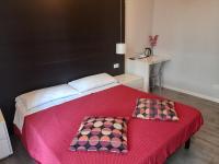 Posteľ alebo postele v izbe v ubytovaní Guest House Piazza Bologna