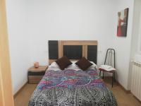 A bed or beds in a room at Alba Renueva 6