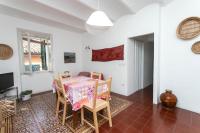 A television and/or entertainment centre at S190 - Sirolo, trilocale in piazza