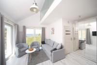Telewizja i/lub zestaw kina domowego w obiekcie Porta Mare Apartments LuxView III