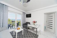 Telewizja i/lub zestaw kina domowego w obiekcie Porta Mare Apartments LuxView III