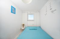 Łóżko lub łóżka w pokoju w obiekcie Porta Mare Apartments LuxView III