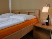 Postel nebo postele na pokoji v ubytování Pension Aspen Harrachov