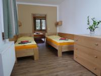 Postel nebo postele na pokoji v ubytování Pension Aspen Harrachov