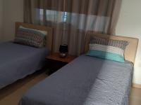 Postel nebo postele na pokoji v ubytování Sunset Villa