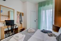 Posteľ alebo postele v izbe v ubytovaní Hotel Christian Ideale Per Famiglie