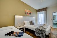 Posteľ alebo postele v izbe v ubytovaní Hotel Christian Ideale Per Famiglie