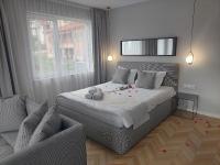 Postel nebo postele na pokoji v ubytování Студио с вана и гледка в "The House" с Термална зона
